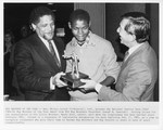 Mickey Leland accepting Big Brother Of The Year Award with Randy Kier by The Mickey Leland Papers & Collection Addendum. (Texas Southern University, 2018)