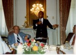 Mickey Leland with boxing champion Sugar Ray Leonard ; Jim Wright ; Unknown others ; at dinner in the Capitol by The Mickey Leland Papers & Collection Addendum. (Texas Southern University, 2018)