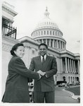 Mickey Leland with students; Mary kay on steps on U.S. Congress by The Mickey Leland Papers & Collection Addendum. (Texas Southern University, 2018)