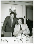Mickey Leland with Larry Hagman at Dinner Table by The Mickey Leland Papers & Collection Addendum. (Texas Southern University, 2018)