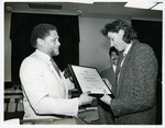Mickey Leland presenting Arts Caucus Award to Bob Geldorf by The Mickey Leland Papers & Collection Addendum. (Texas Southern University, 2018)