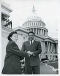 Mickey Leland with students; Mary kay on steps on U.S. Congress by The Mickey Leland Papers & Collection Addendum. (Texas Southern University, 2018)
