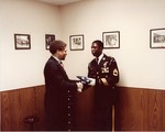Mickey Leland with Honor Guard in office by The Mickey Leland Papers & Collection Addendum. (Texas Southern University, 2018)